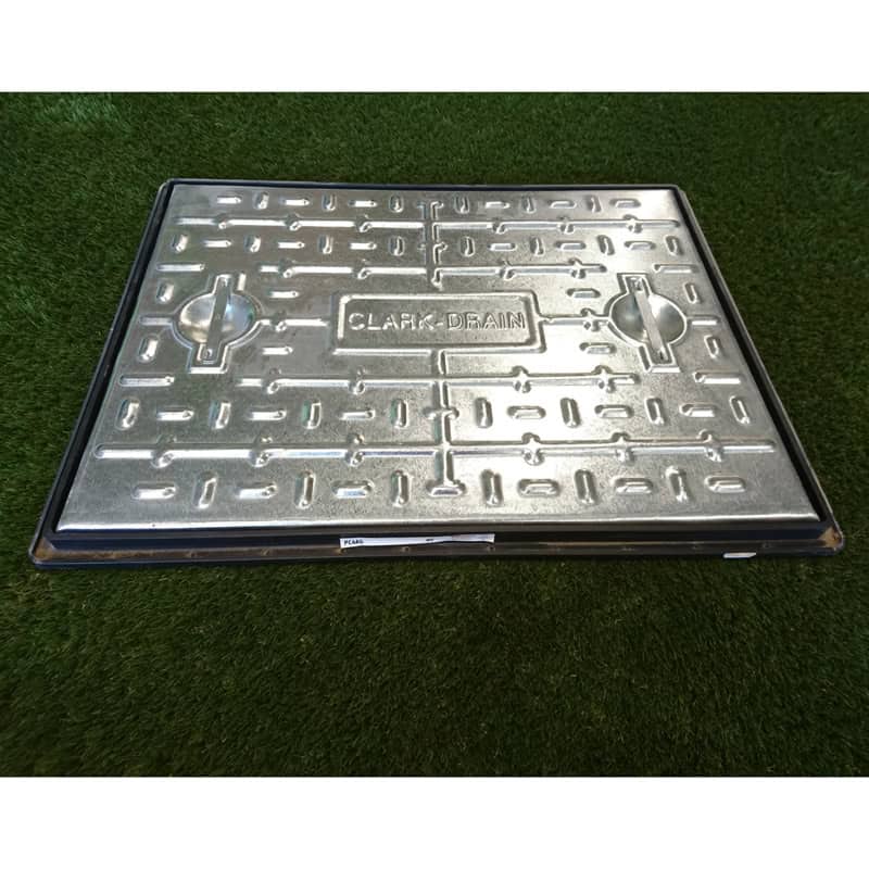 A metallic 600x450mm Pedestrian Manhole Cover & Frame with 