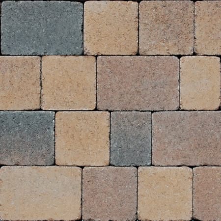 Close-up of a brick wall showcasing Barleystone Kingspave Cobble Chestnut with earthy rectangular bricks in chestnut brown, beige, and gray. The evenly aligned bricks create a uniform and rustic appearance typical of Kingspave Cobble designs.