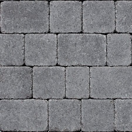 The Barleystone Kingspave Cobble Damson stones are set in a grid, featuring a brick-like layout. Their textured surface and slight color variations offer a uniform, structured look reminiscent of elegant cobblestones.