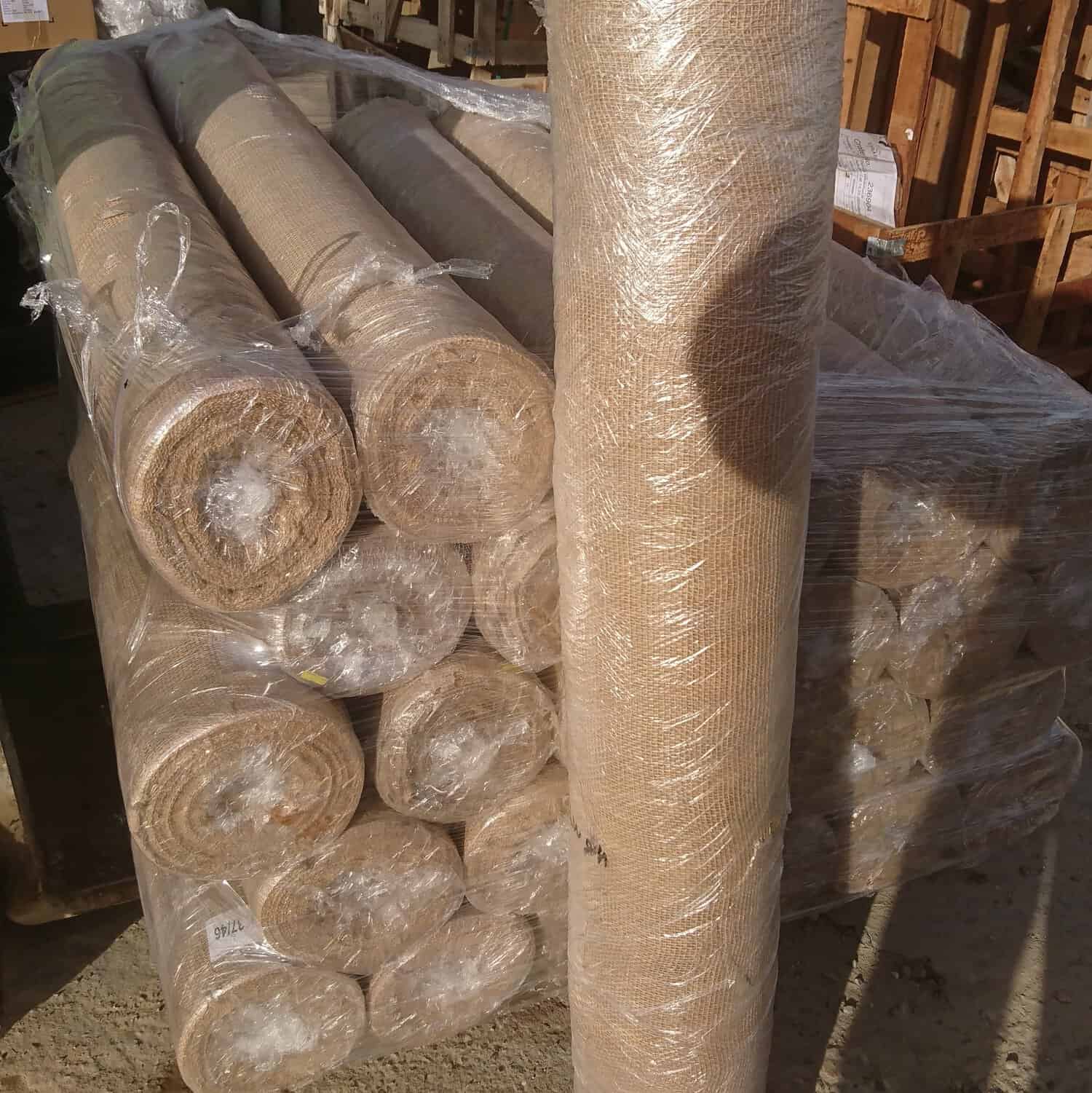 Hessian Frost Protection Rolls, wrapped meticulously in plastic, rest securely on a pallet, ready to offer essential frost protection.