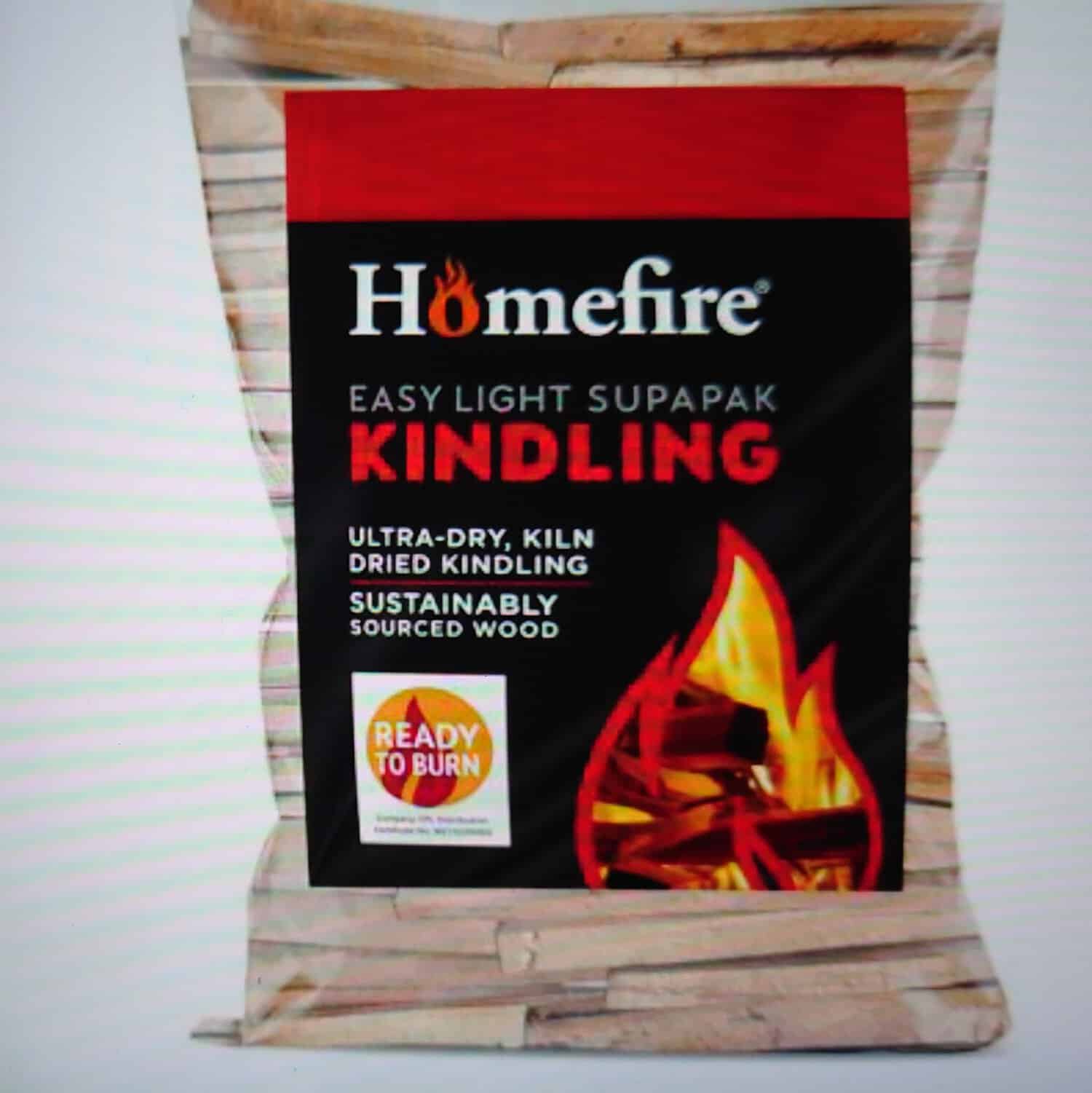 The Homefire Supapak Kindling Pack features a black label with red and white text and a flame illustration. Made from sustainably sourced ultra-dry, kiln-dried wood, it ensures both efficiency and environmental friendliness.