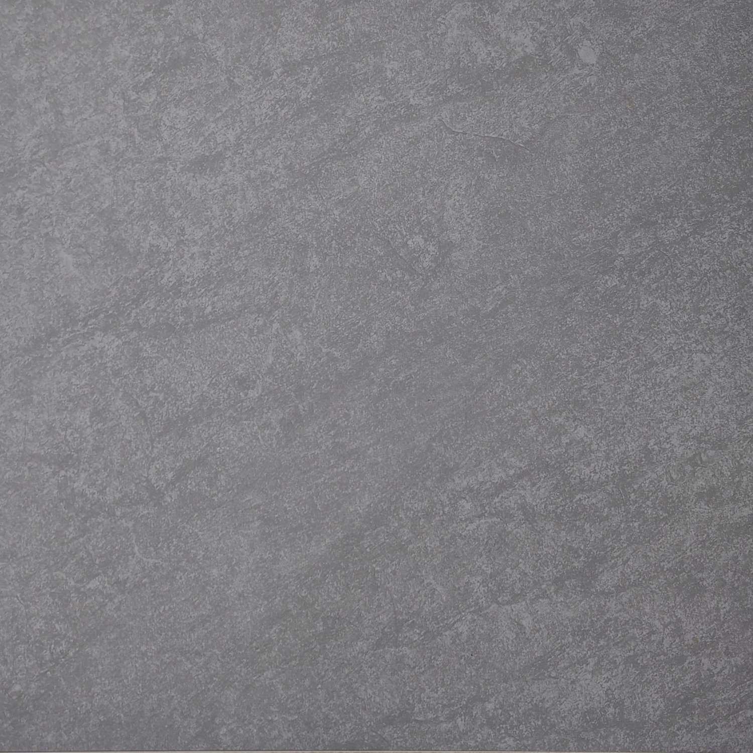 A close-up of the Aura Grey Porcelain 600x600x20mm reveals its rough, textured surface with natural variations and patterns, showcasing a rugged and earthy appearance.